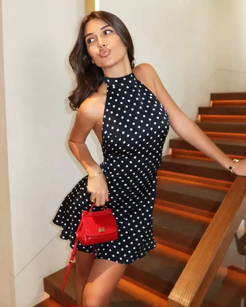black white polka dot halter dress Elegant white halter dress with black polka dots
