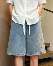 Short en jean brodé