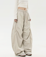 Pantalon parachute oversize​