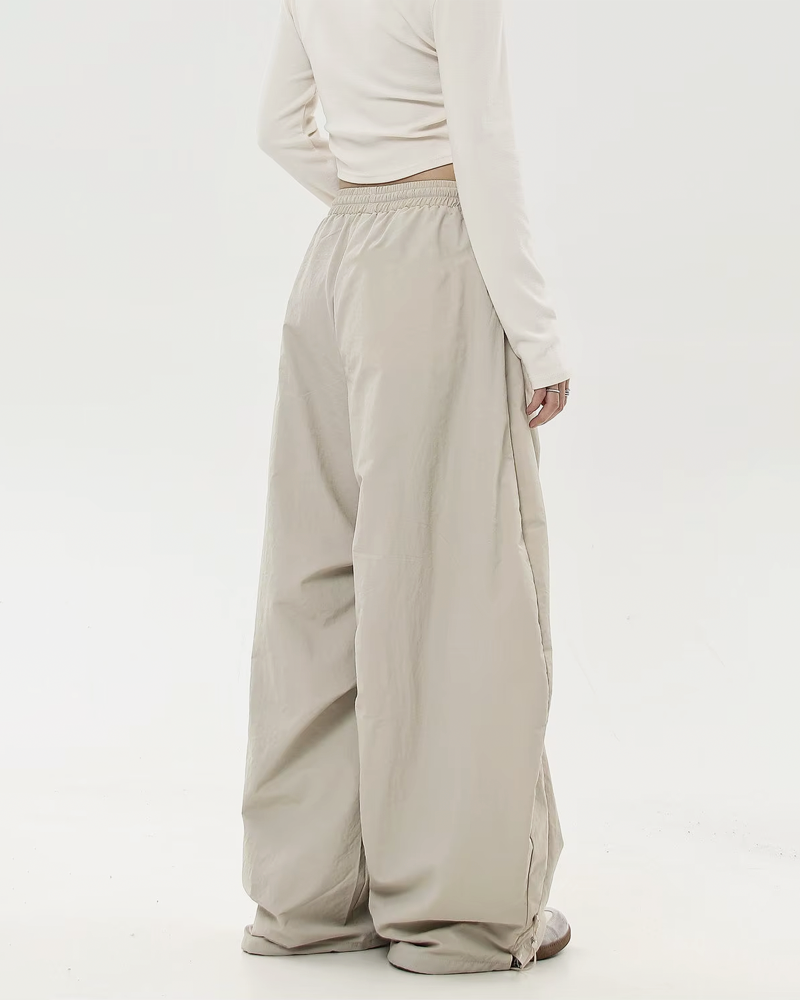 Pantalon parachute oversize​