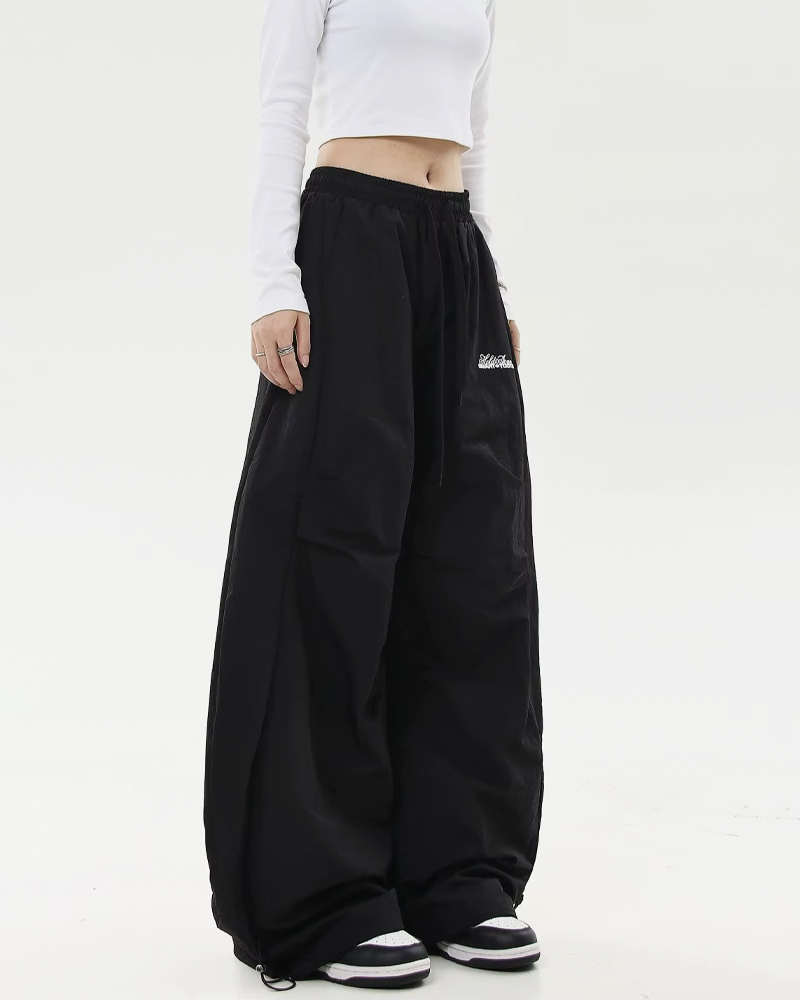 Pantalon parachute oversize​