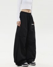Pantalon parachute oversize​