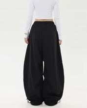 Pantalon parachute oversize​