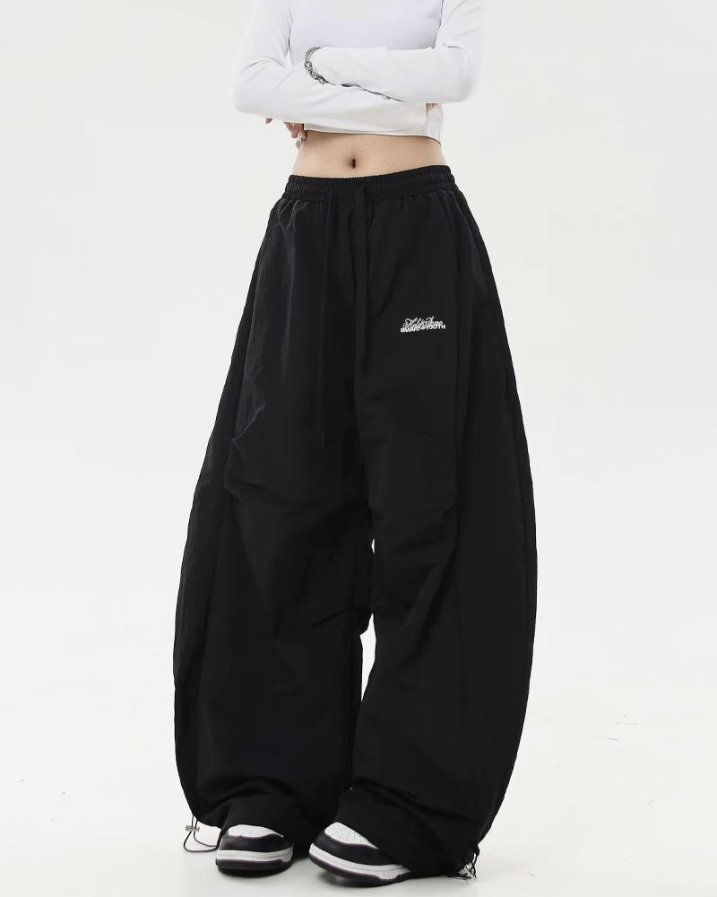 Pantalon parachute oversize​